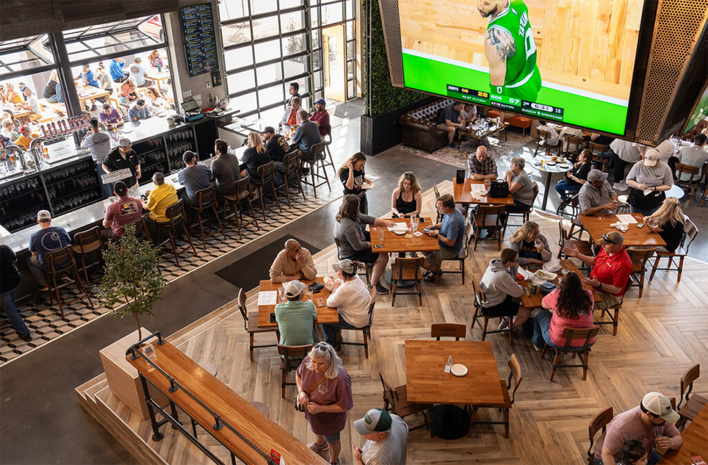 Three Wide Brewing taproom filled with patrons